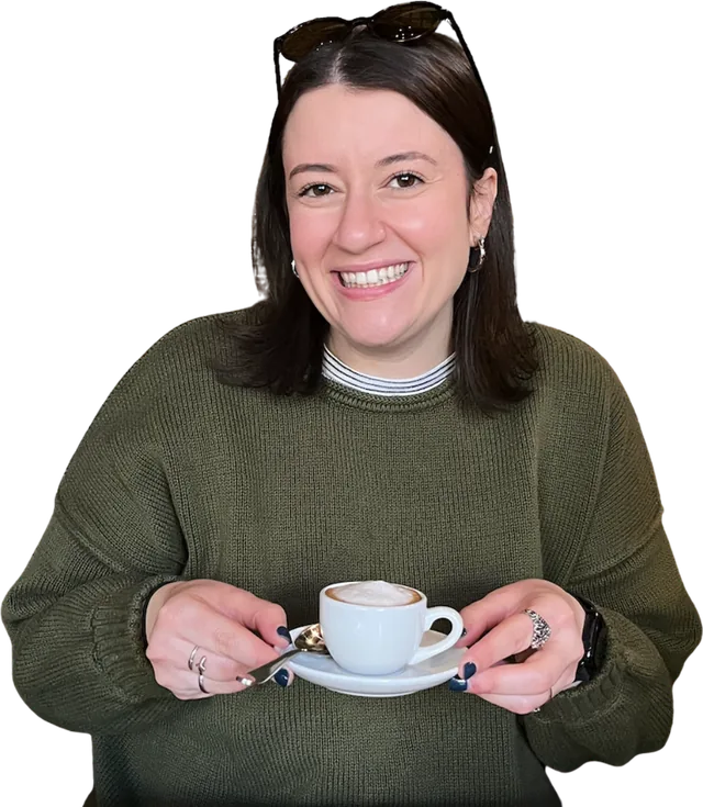 Joelle Moriarty holding a cappuccino